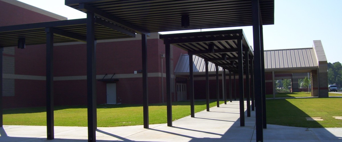 aluminum canopies covering school walkways