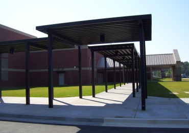 aluminum canopies covering school walkways